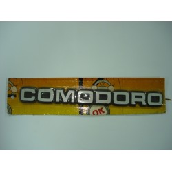 Emblema Comodoro Plástico