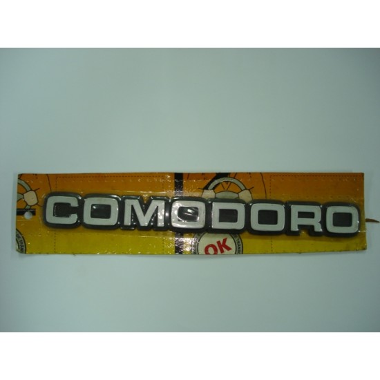 Emblema Comodoro Pl&aacute;stico